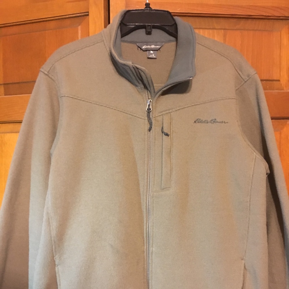 Zip up jacket.